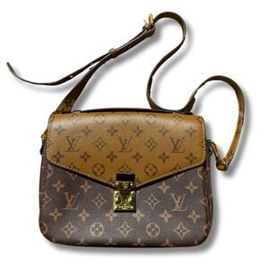 Louis Vuitton pouchette Métis